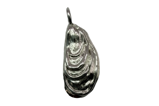 Sculpted silver teardrop with layered ripple contours and high-shine finish