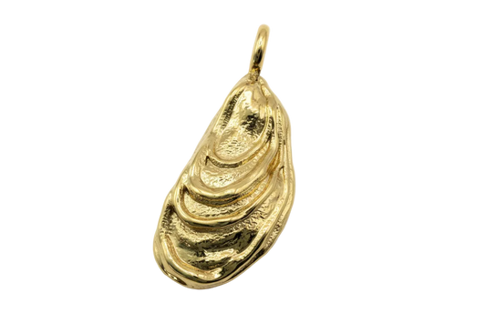 Gold teardrop charm with layered ripple texture and high-polish shine