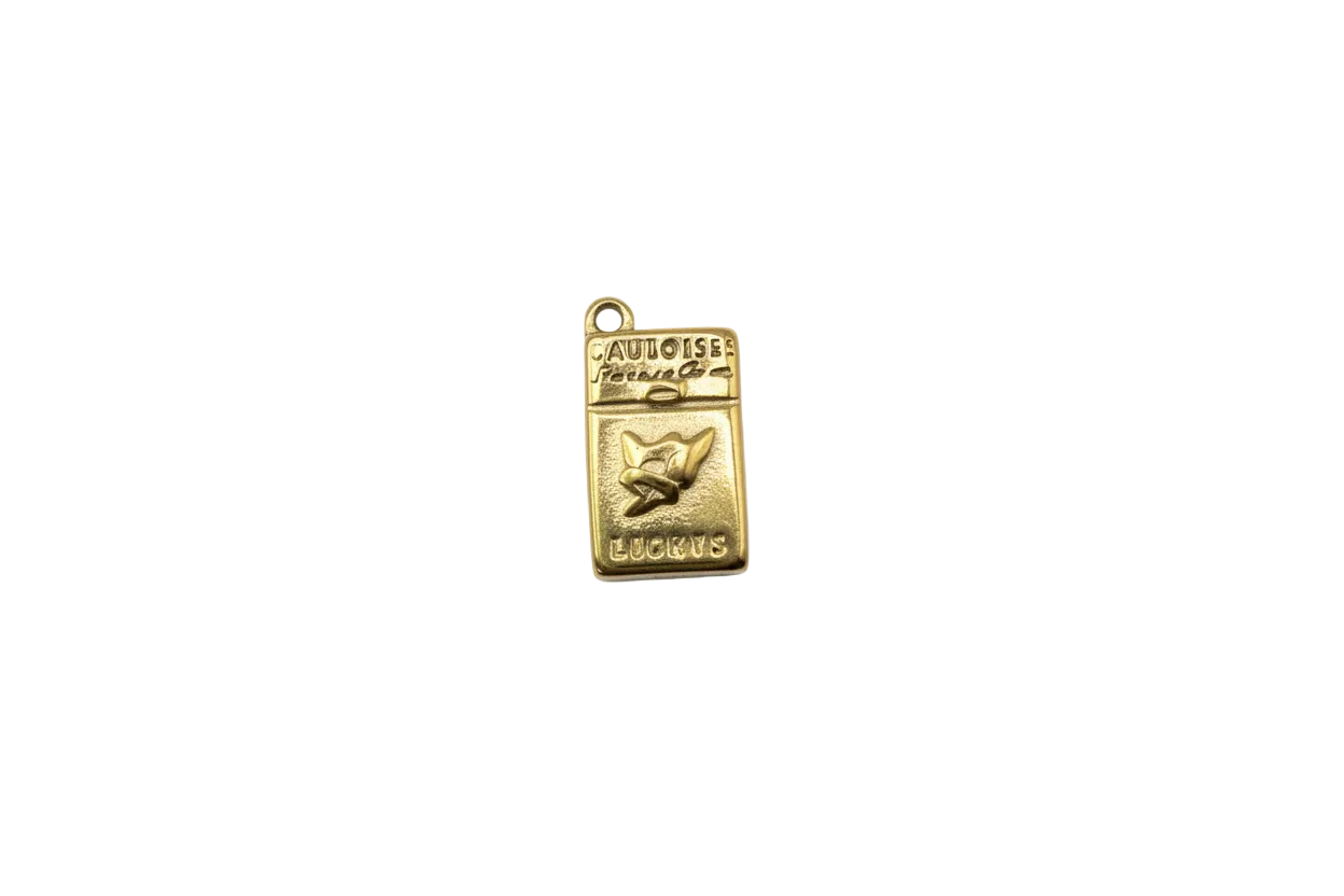 Gold cigarette pack charm with raised lettering and bird emblem