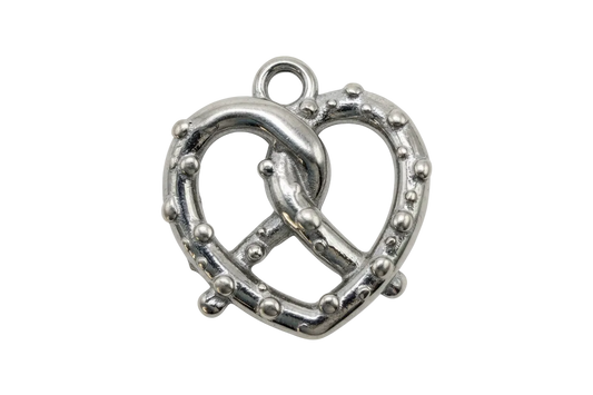 Polished silver pretzel charm with raised salt-like bead texture