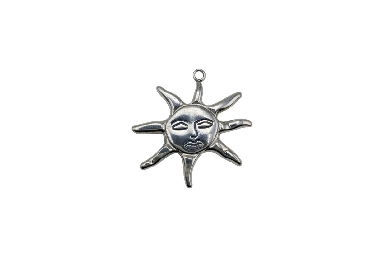Silver sun face medallion with radiating rays
