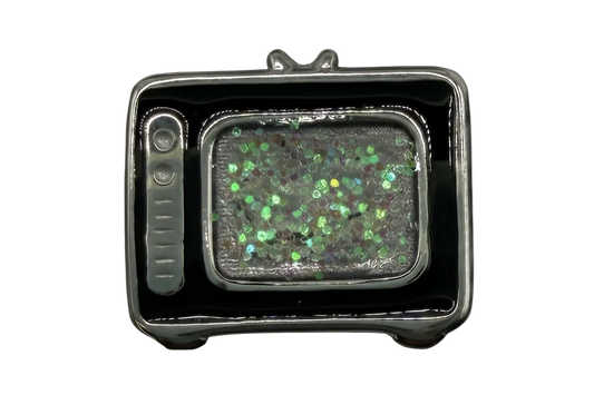 Silver and black retro television charm with an iridescent glitter screen