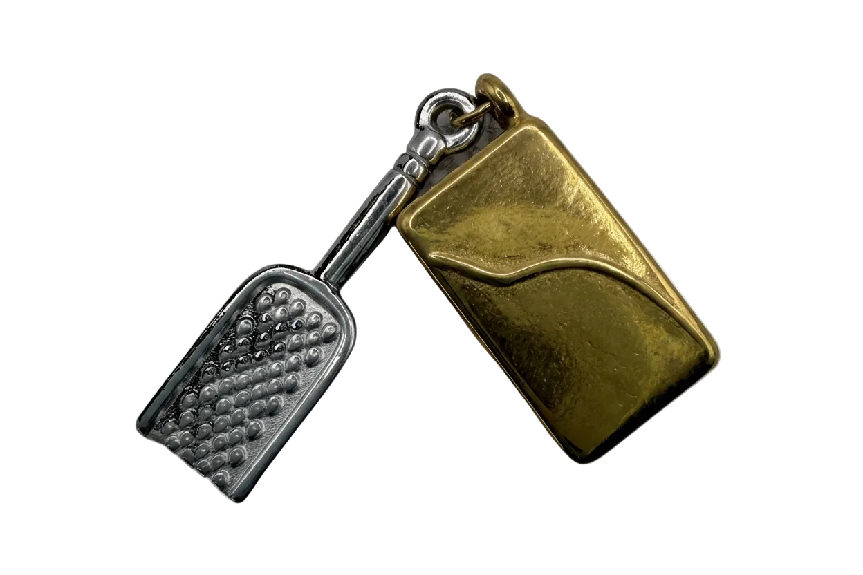 Two-tone key and padlock charm in polished gold and silver with textured key head