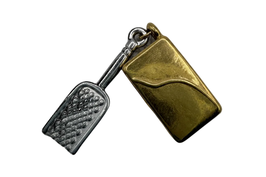 Two-tone key and padlock charm in polished gold and silver with textured key head
