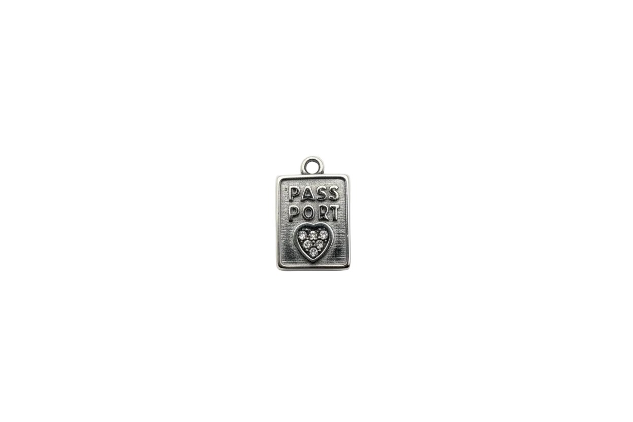 Silver passport tag with PASS PORT text and crystal heart