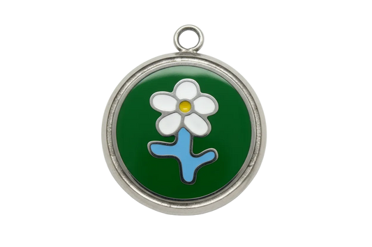 Round silver medallion with green enamel background and white flower with yellow center and blue stem