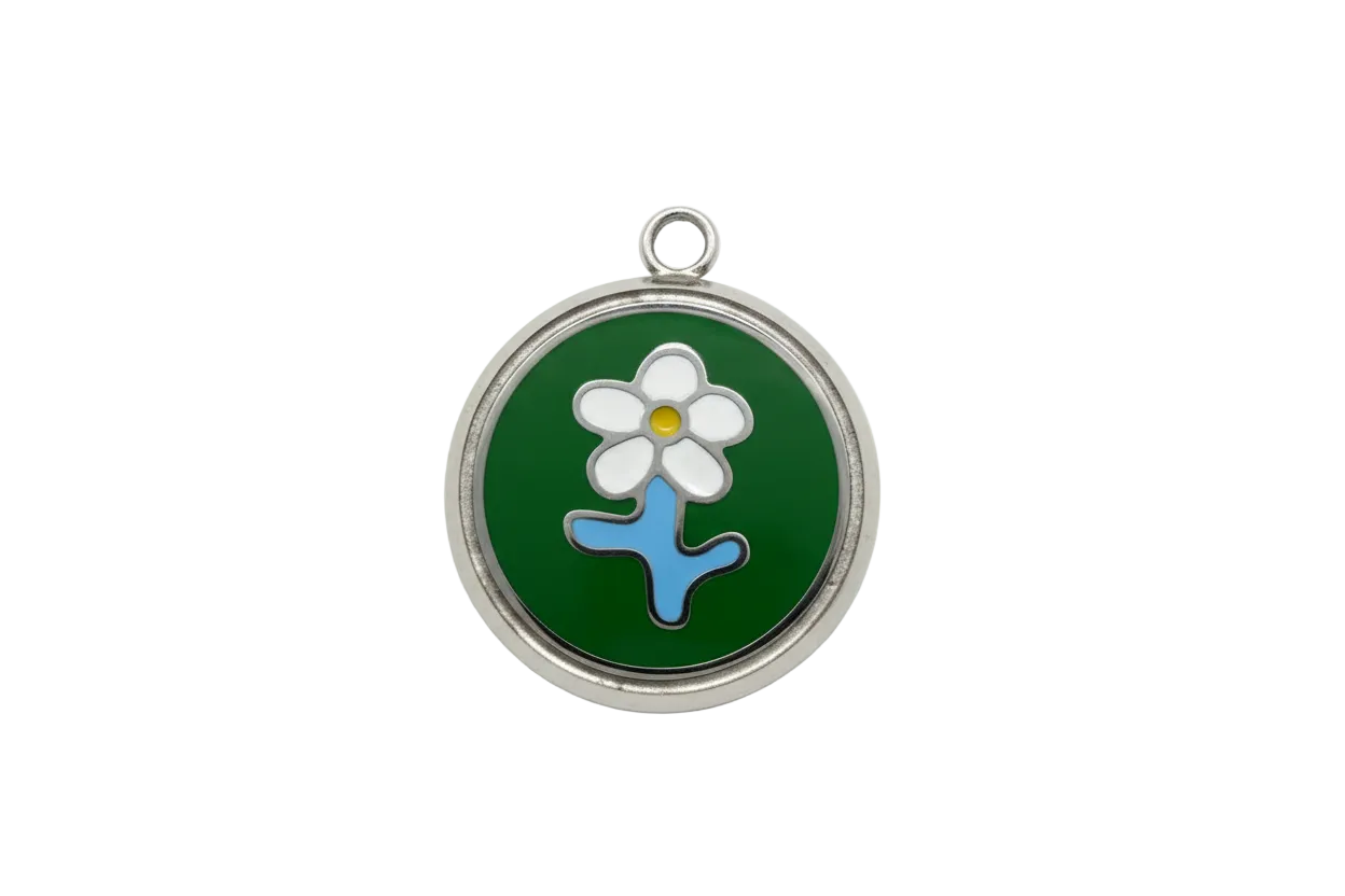 Round silver-tone charm with white daisy on glossy green enamel, yellow center and blue stem