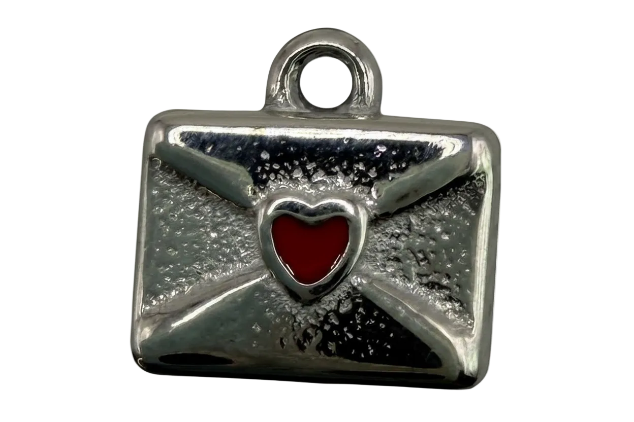 Polished silver envelope charm with textured finish and a glossy red heart seal