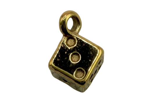 Glossy black dice charm with raised gold pips and polished gold border