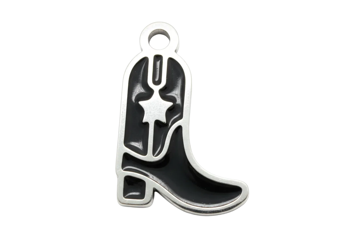 Silver cowboy boot charm with glossy black enamel and star spur detail