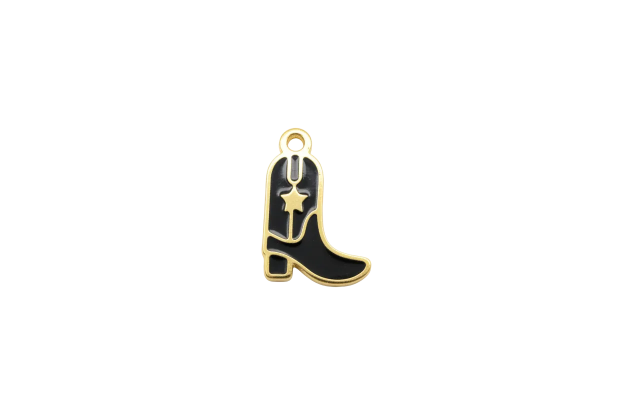 Black cowboy boot with gold outline and star detail