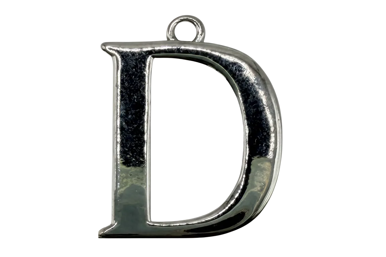 Polished silver letter D initial with black inlay and reflective finish