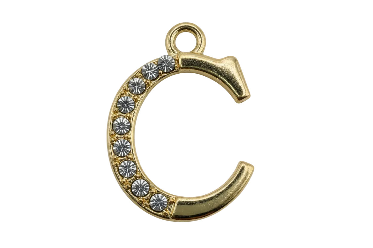 Gold pavé initial C with clear crystal accents