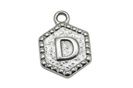 Antiqued silver hexagon medallion with raised letter D and textured background