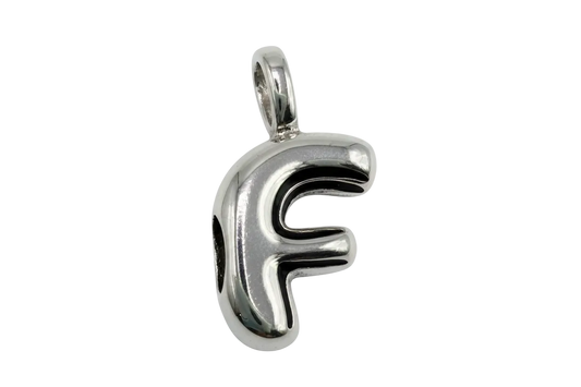 Mirror-polished silver letter F initial charm with rounded, puffy silhouette