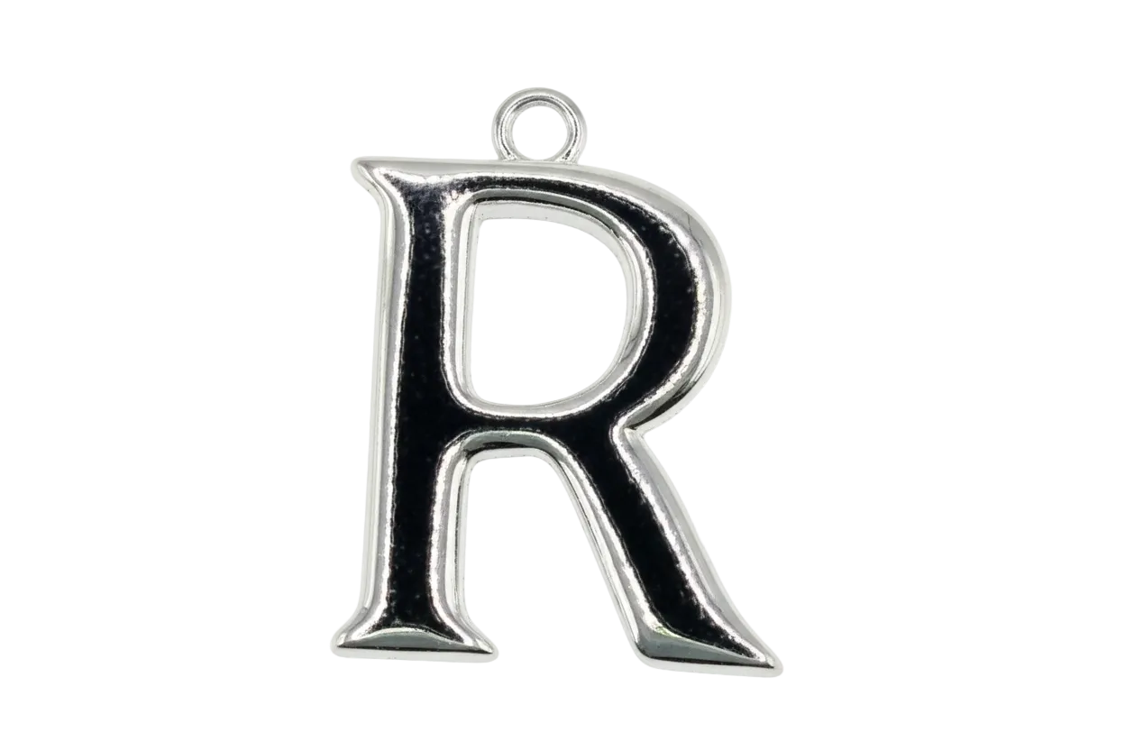 Polished silver-tone letter R initial charm on black background