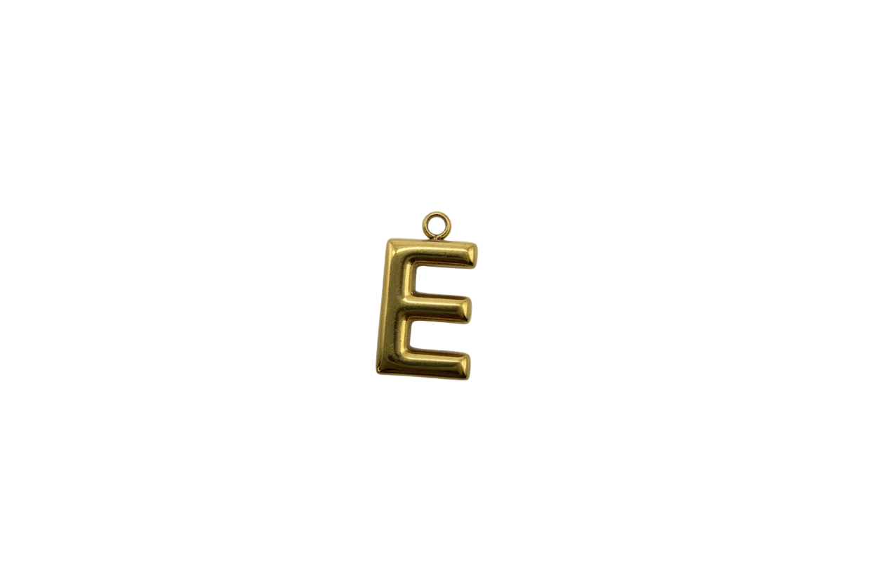 Polished gold block letter E on black background