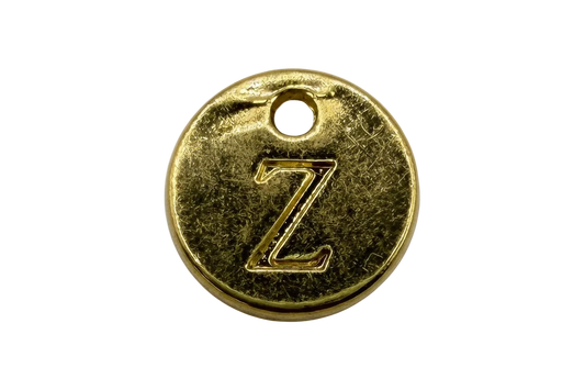 Round gold disc with engraved letter Z