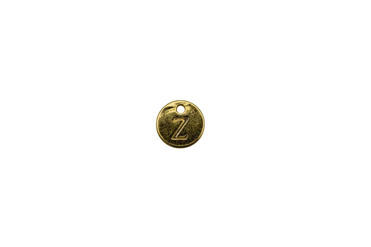 Gold disc with engraved Z initial