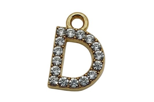 Gold letter D initial outlined with clear pavé gems
