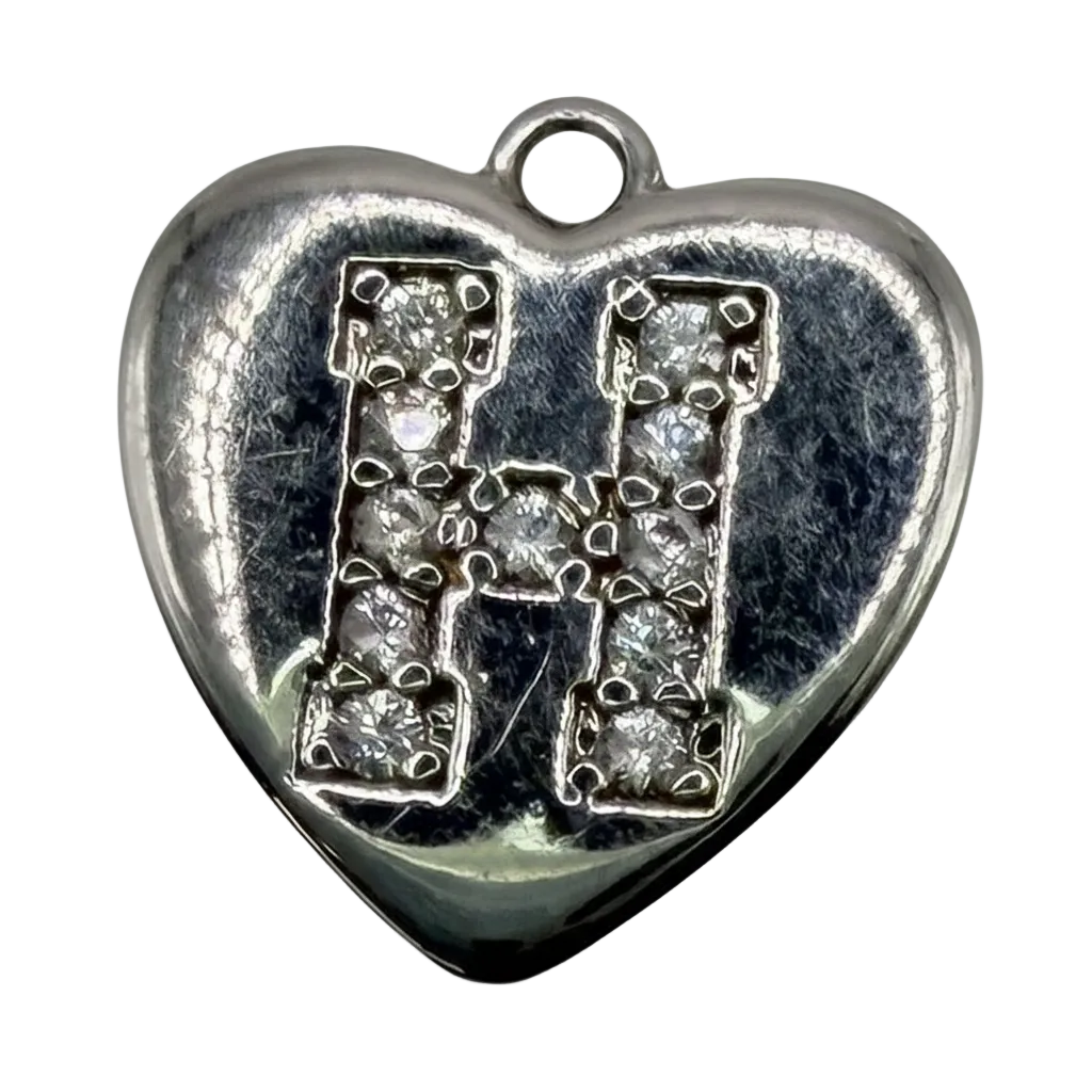 Polished silver heart charm with pavé letter H in clear crystals
