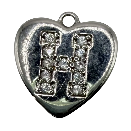 Polished silver heart charm with pavé letter H in clear crystals