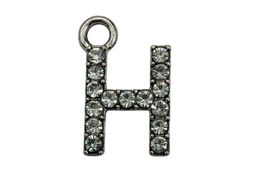 H initial outlined with pavé clear crystals on silver-toned metal