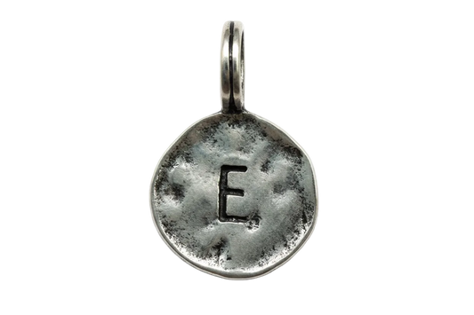 Antiqued silver round coin with stamped letter E