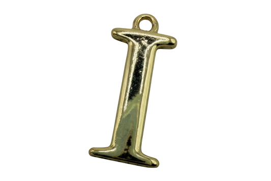 Polished gold letter I with serif styling on black background