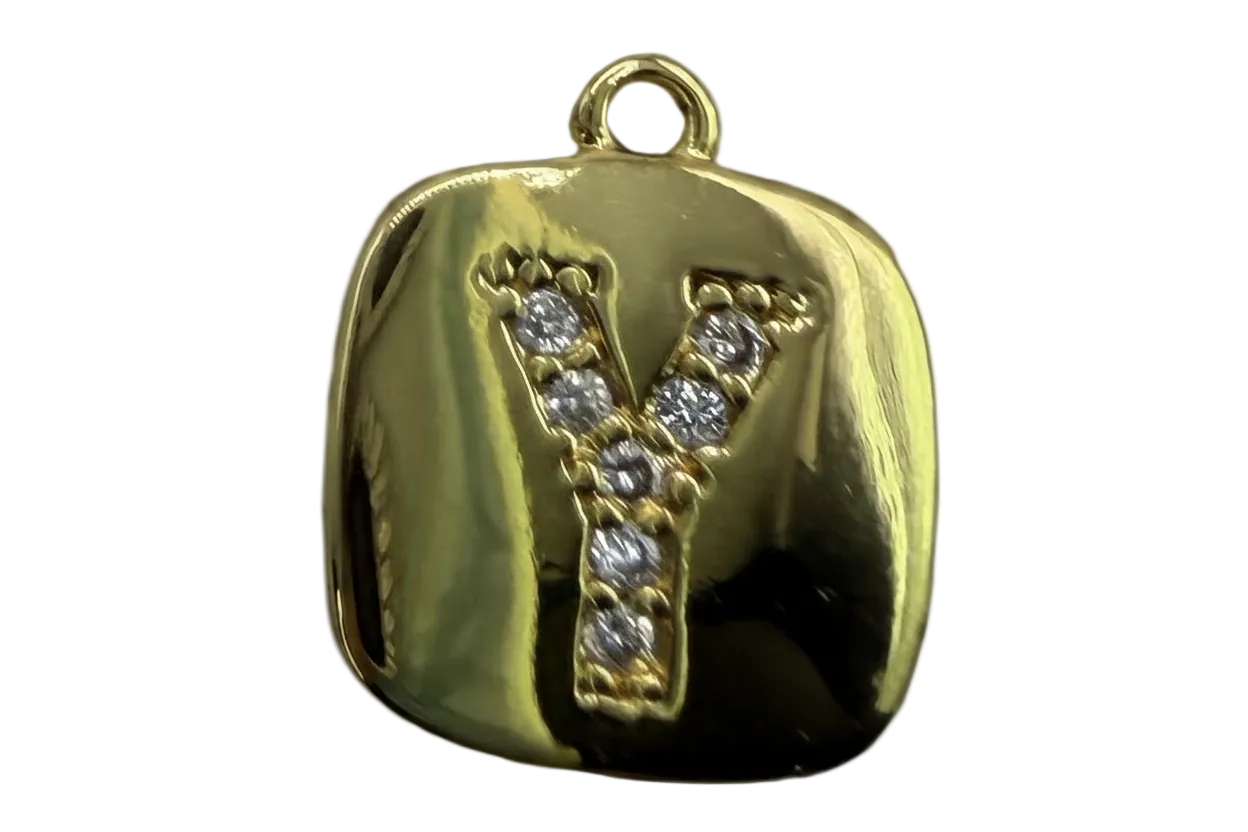 High-polish gold rounded tile with pavé letter Y in clear crystals