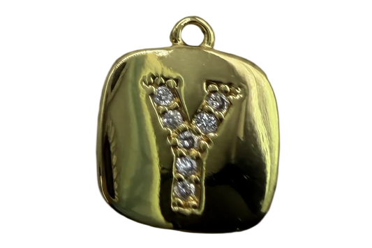 High-polish gold rounded tile with pavé letter Y in clear crystals