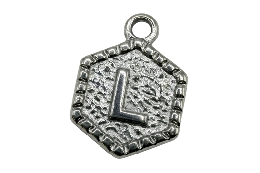 Silver-tone hexagon medallion with raised letter L and textured background
