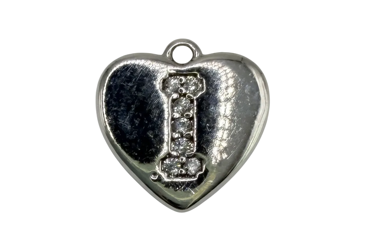 Polished silver heart with pavé initial I in clear crystals