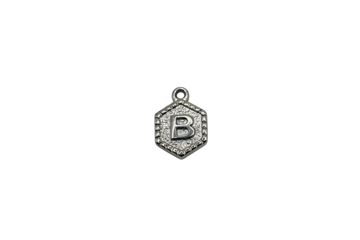 Antiqued silver-tone hexagon medal with raised letter B and textured border