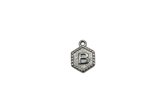 Antiqued silver-tone hexagon medal with raised letter B and textured border