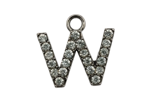 Silver pavé crystal letter W with clear faceted stones on a black background