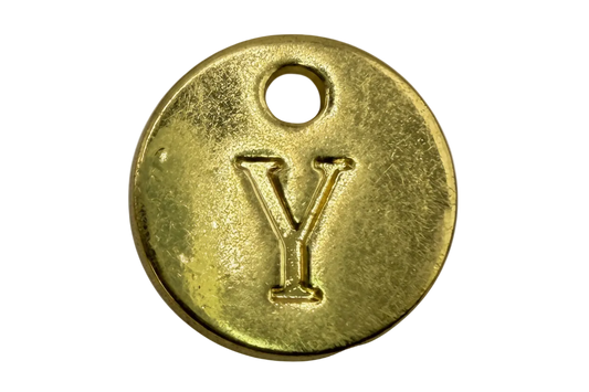 Round gold initial coin with raised letter Y and brushed finish