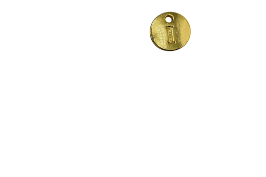 Round gold disc with embossed letter I and a small top hole