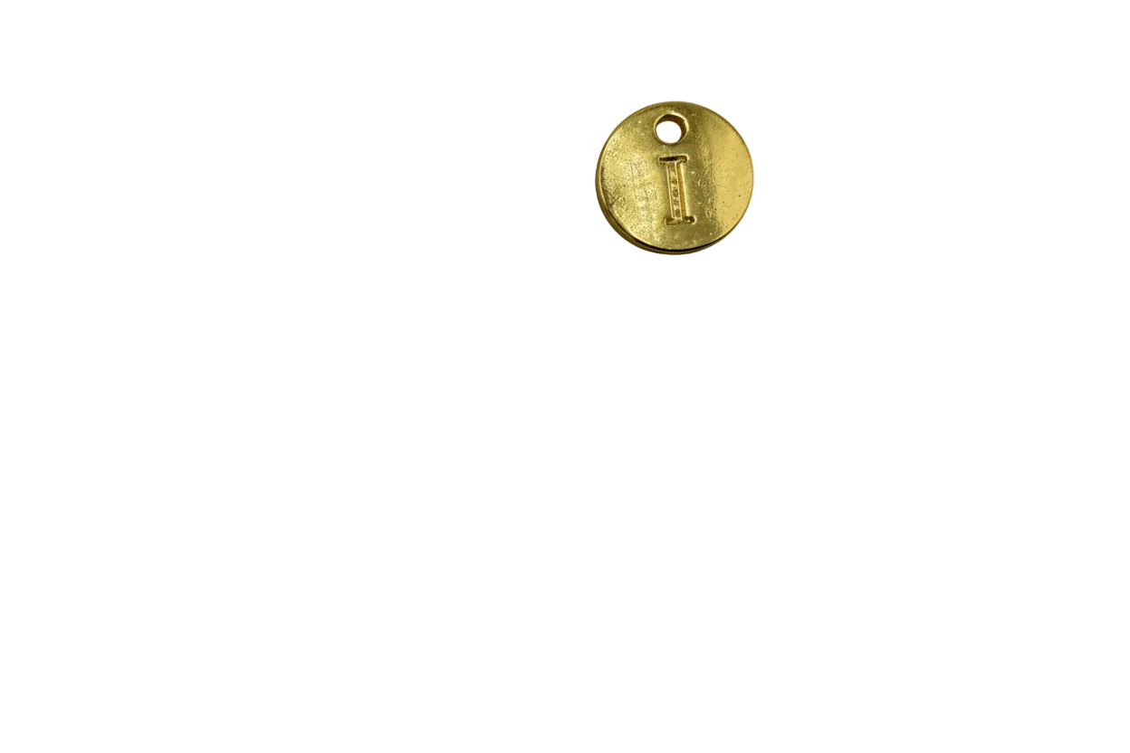 Gold round disc with embossed letter I