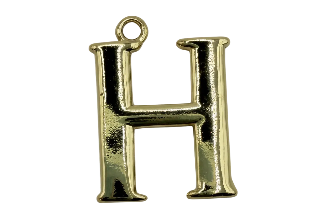 Polished gold letter H initial charm with glossy finish