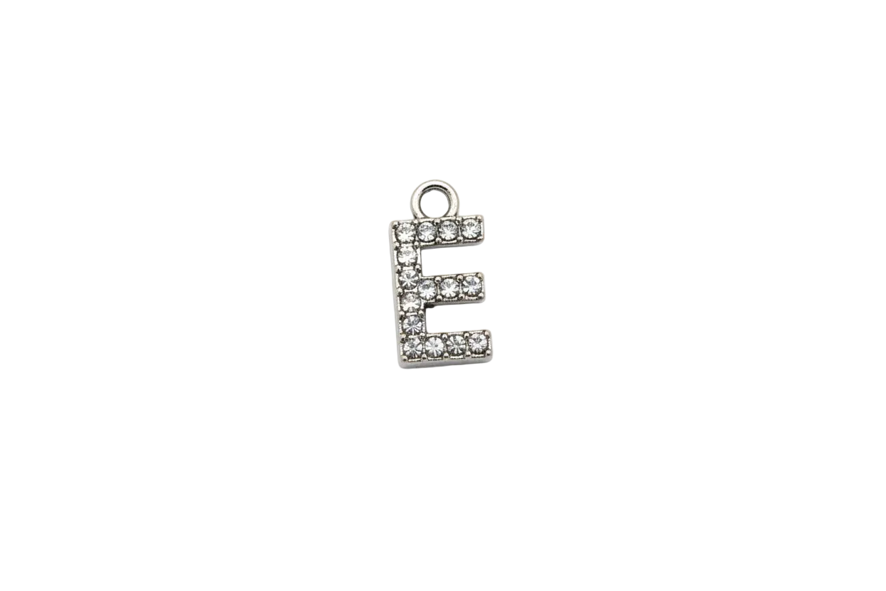 Silver letter E charm with pavé clear crystals on a black background