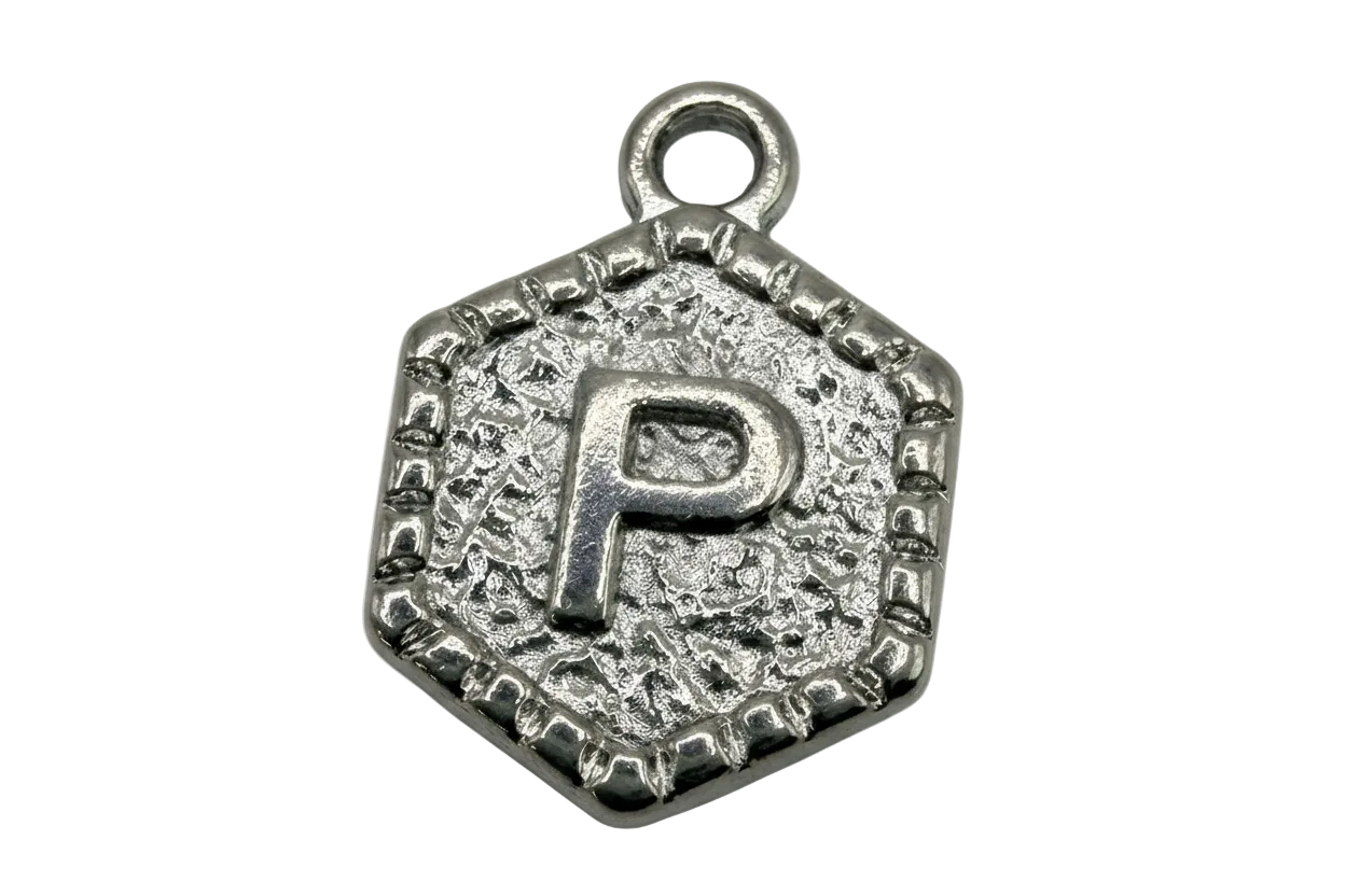 Textured silver octagon coin with raised letter P and beaded border