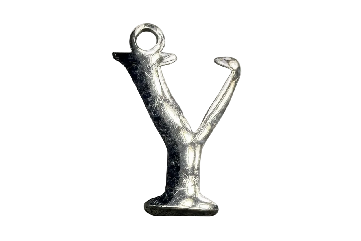 Polished silver letter Y charm with a round cutout at the top