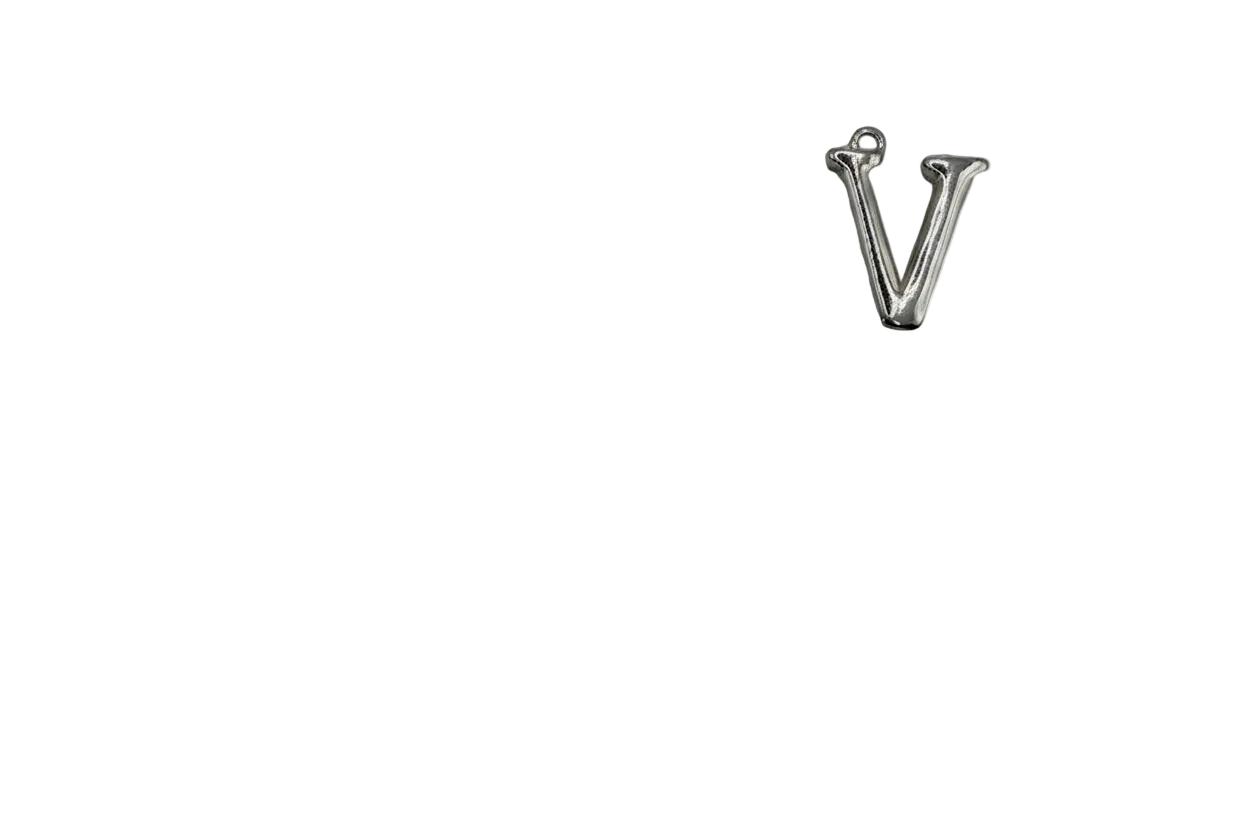 Polished silver letter V on black background
