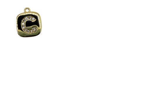 Gold rounded square tile with black enamel and pavé letter C in clear crystals