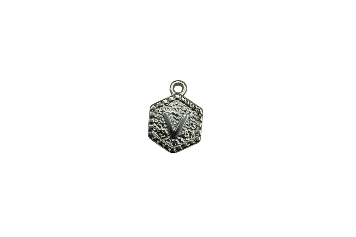 Textured hexagon medallion with raised letter V