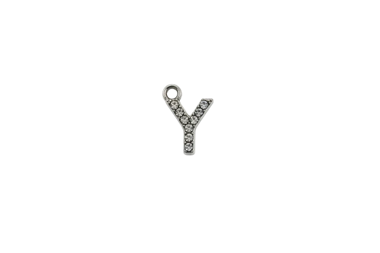 Silver pavé letter Y initial with clear crystals on a black background