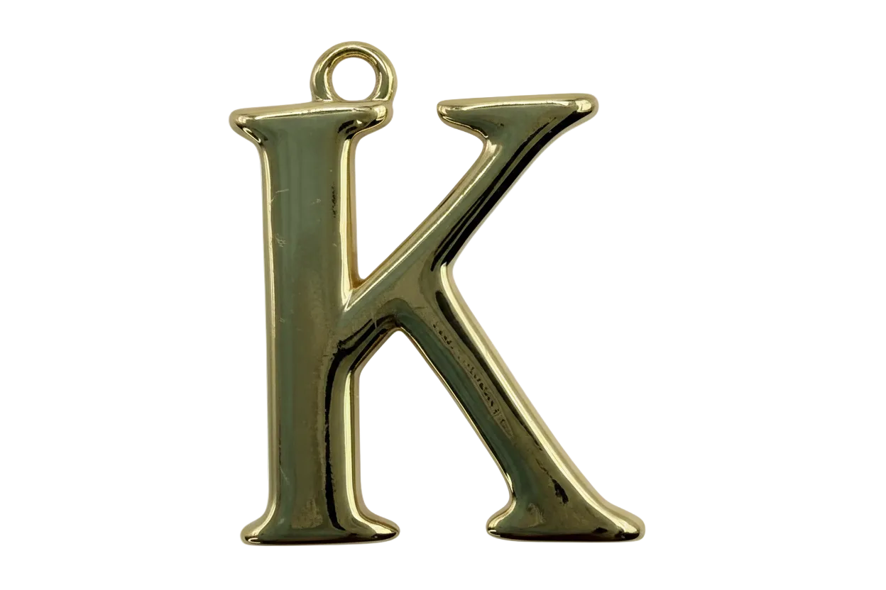 Polished gold letter K initial charm with high-shine metal finish