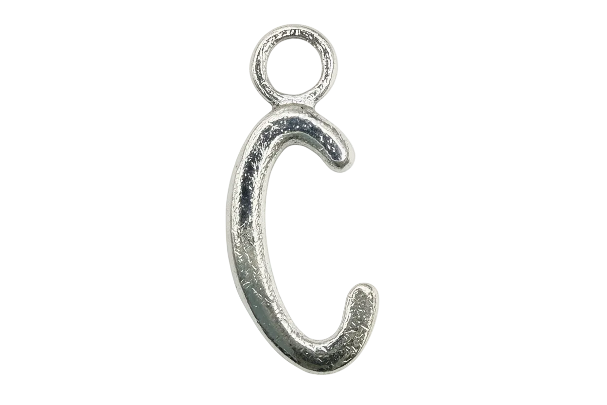 Polished silver-tone script letter C with rounded contours on a black background