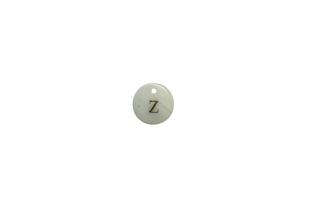 White round disc with gold letter Z